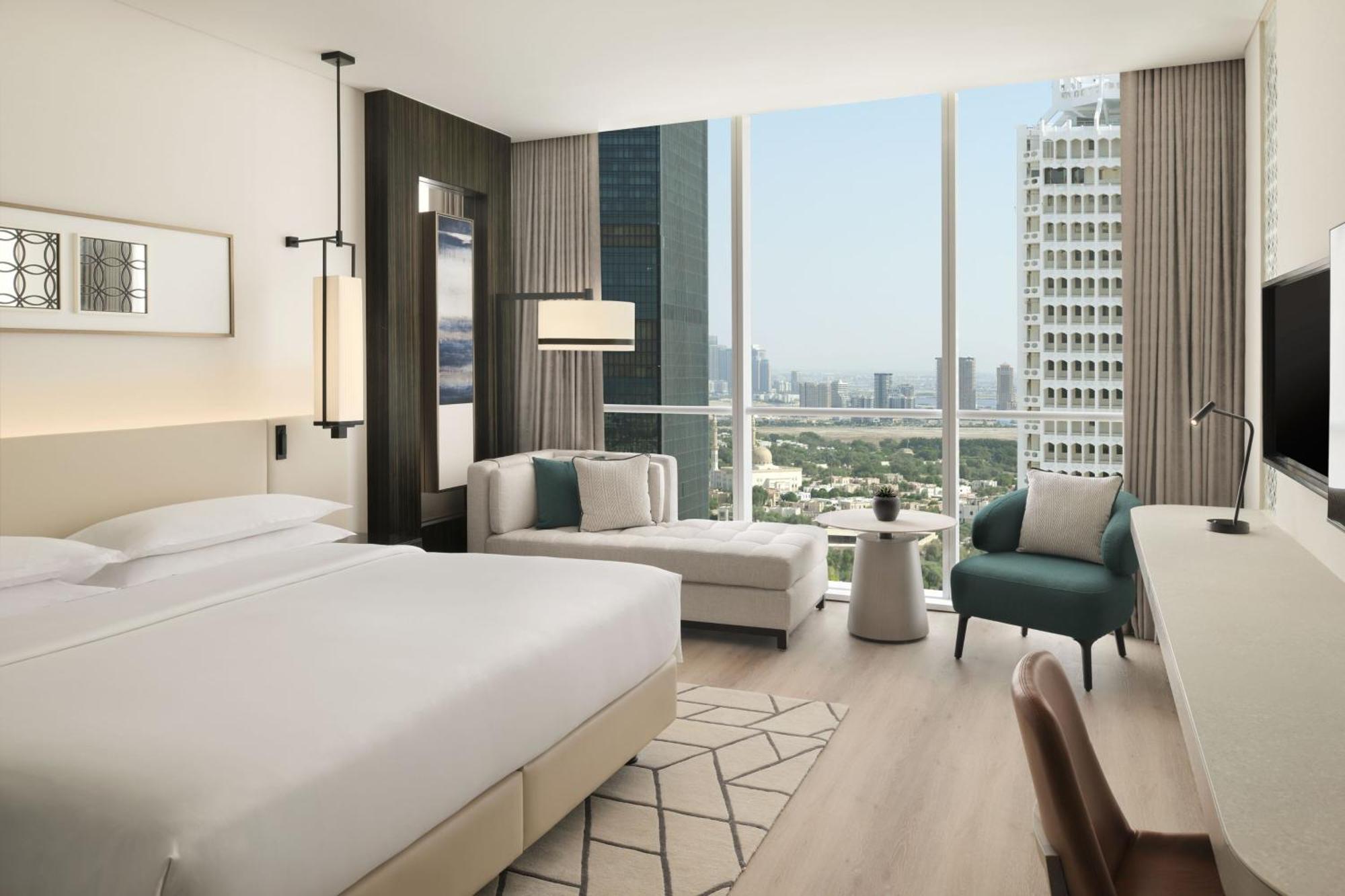 Habitación Club con cama extragrande y acceso al club lounge