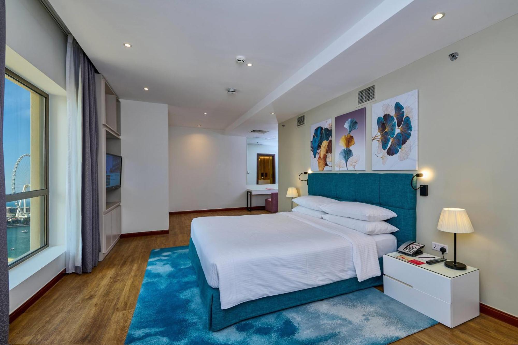Suite mit 1 Schlafzimmer mit Kingsize-Bett und eingeschränktem Meerblick